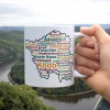 Saarmundart-Tasse mit Saarland-Umriss. Hochwertig bedruckt, spülmaschinenfest & liebevoll im Saarland gefertigt. Jetzt entdecken!