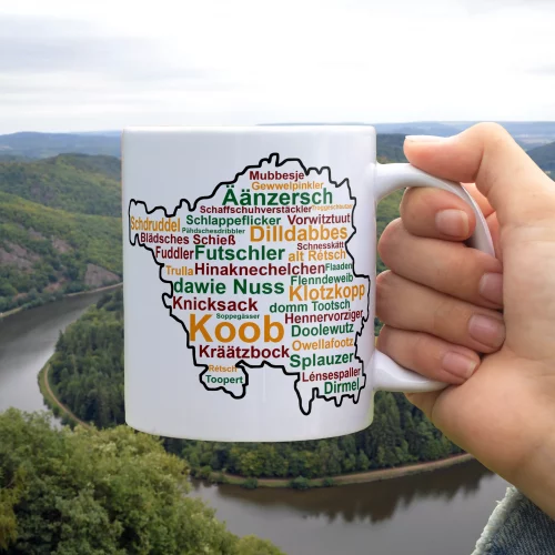 Saarmundart-Tasse mit Saarland-Umriss. Hochwertig bedruckt, spülmaschinenfest & liebevoll im Saarland gefertigt. Jetzt entdecken!